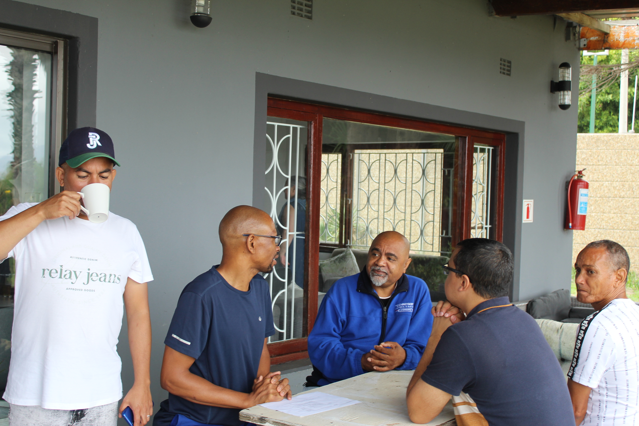 Men discussing the Bible together