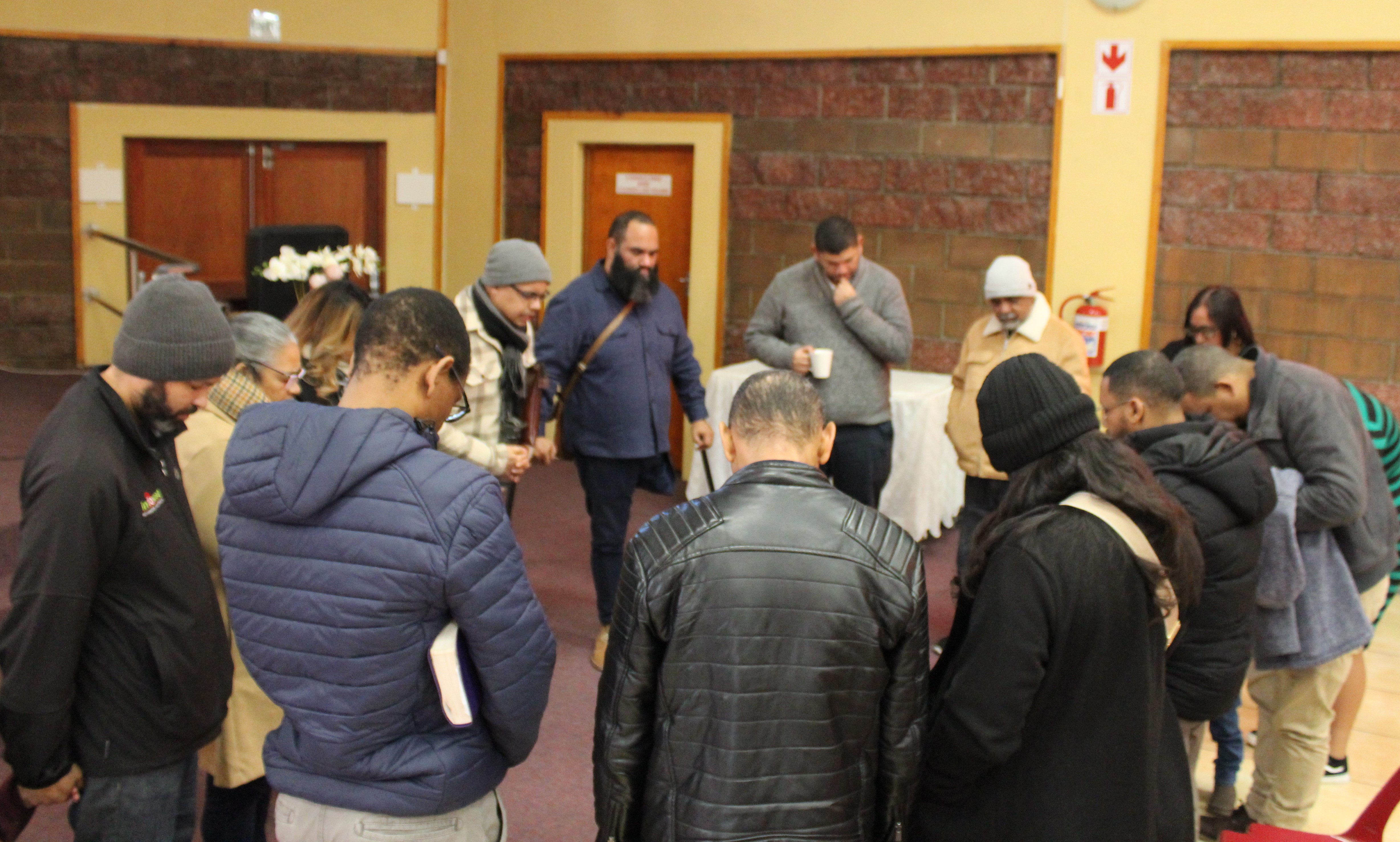 Church members gathered in prayer